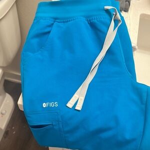 Figs Extreme Blue medium petite Zamora jogger one ink stain as shown.